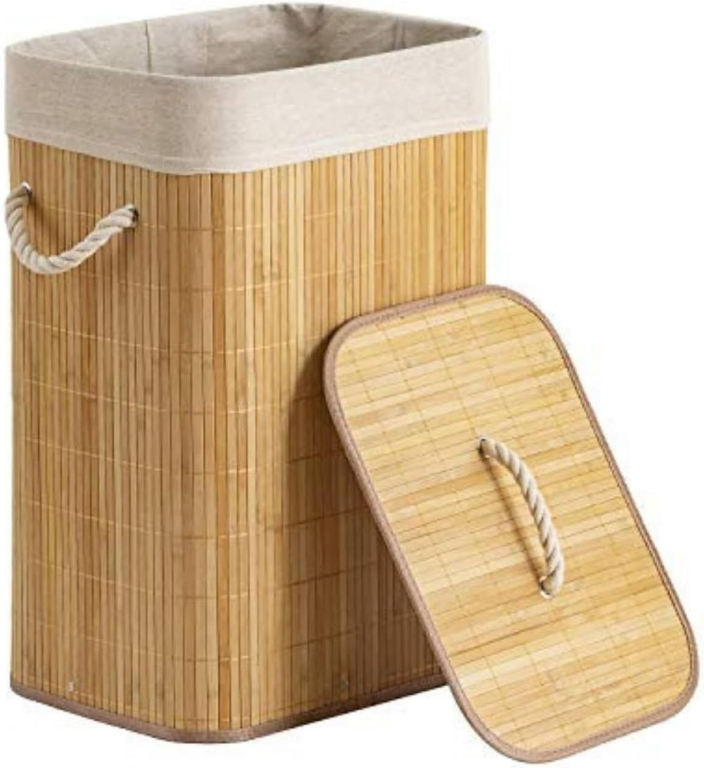 Bamboo laundry basket with a gray towel draped over it in a room setting.