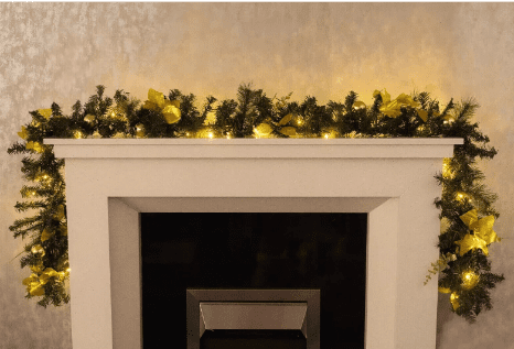 Christmas garland decorated with gold baubles