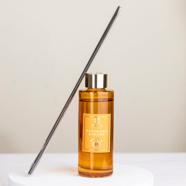 Winter spice home fragrance diffuser styled on a table