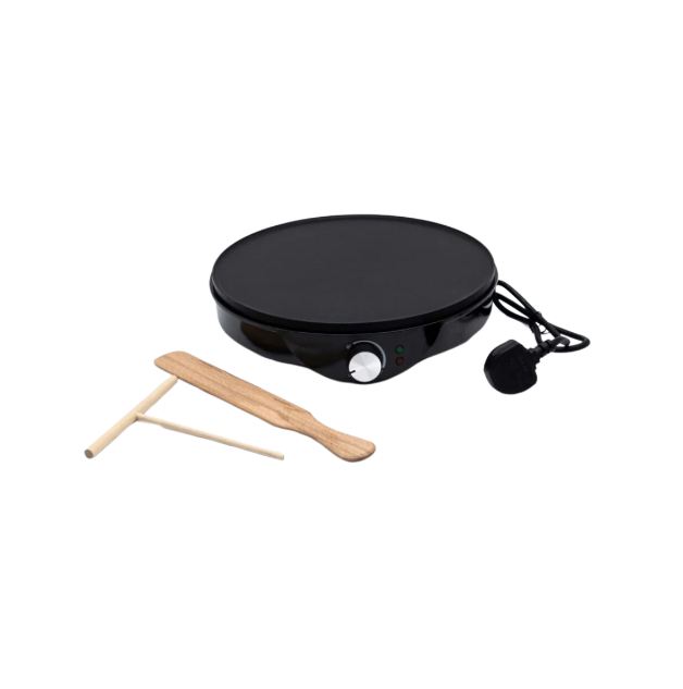 Black electric griddle with wooden spatula on a wooden surface