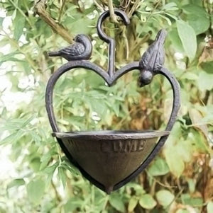Decorative heart bird feeder with welcome sign