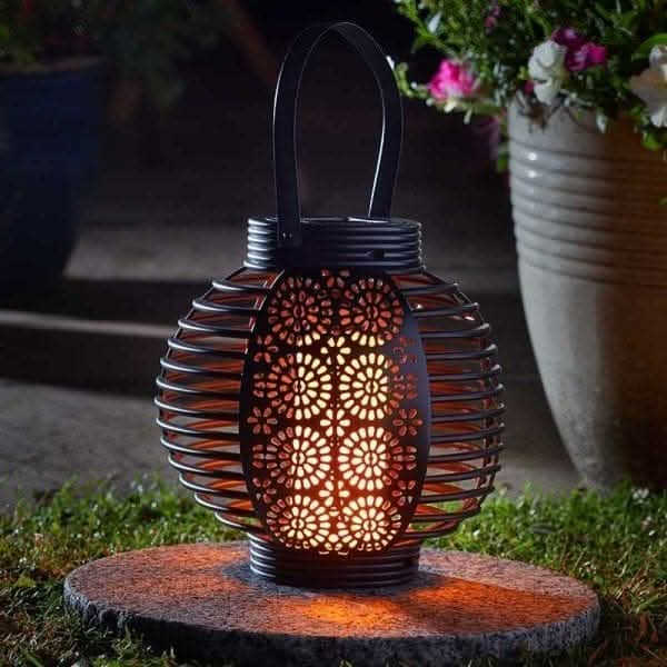 Ferrara lantern with intricate illuminated pattern
