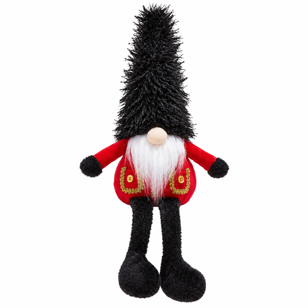 A plush Christmas gnome figurine with a tall black shaggy hat, red coat with gold trim, white beard, and black legs, shown against a plain white background.