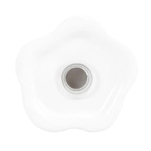A white ceramic knob with a scalloped, flower-like edge and a circular metallic center, shown on a plain white background.