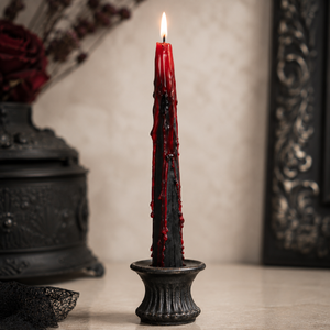 Gothic candles creating a spooky seasonal table setting
