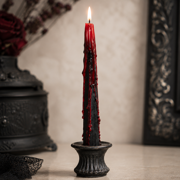 Gothic candles creating a spooky seasonal table setting