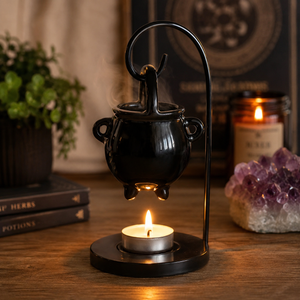 New bone china cauldron suspended from a metal stand