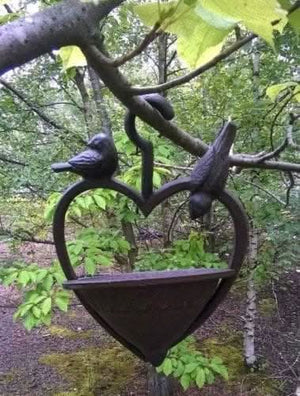 Hanging heart bird feeder for wildlife-friendly gardens