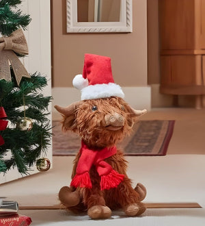 Large plush cow ornament displayed for Christmas