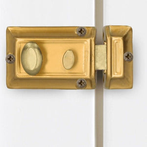 Home security rim lock with polished brass trim