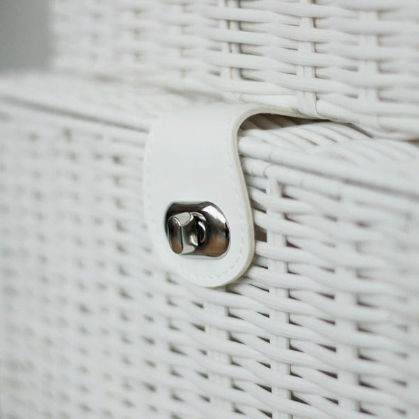 Close-up of a white woven basket with a metal latch.