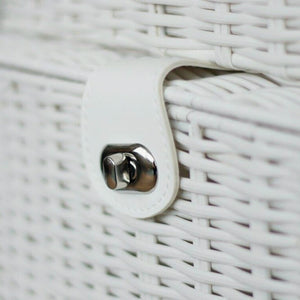 Close-up of a white woven basket with a metal clasp.