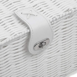 Close-up of a white textured surface with a metal lock mechanism.