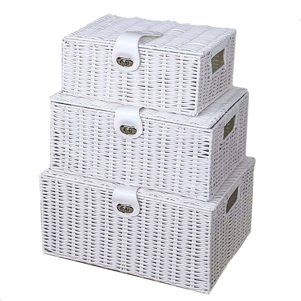 Set of three white wicker storage baskets with lids on a white background