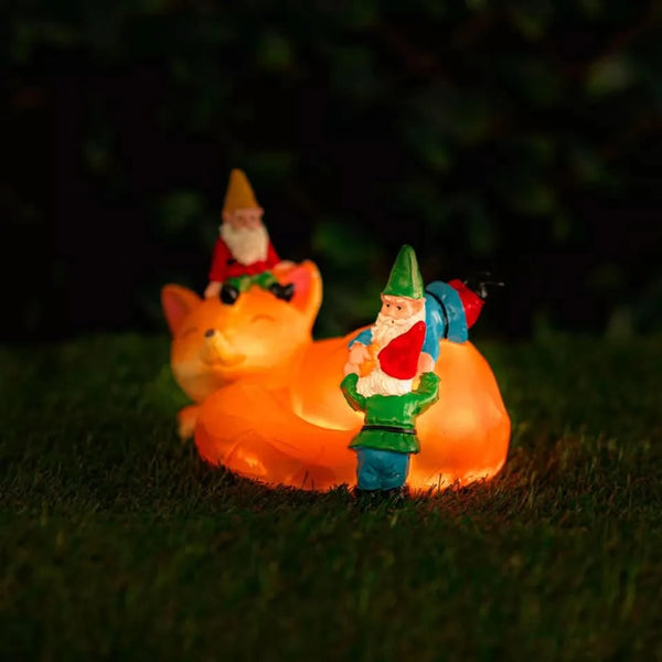 Decorative fox and gnome solar garden statue