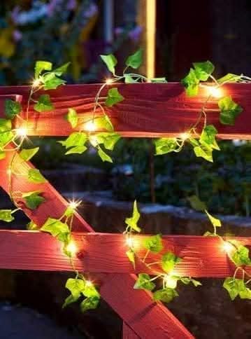 LED solar ivy flower string lights glowing outdoors