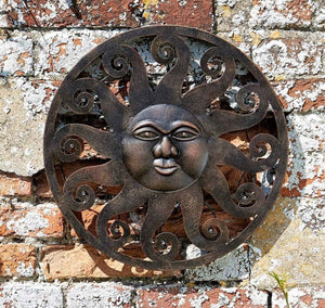 Rustic metal sun garden decoration with illuminated details