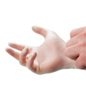 A translucent disposable glove being worn on a hand, with another hand adjusting or pressing the glove against the wrist, isolated on a white background.