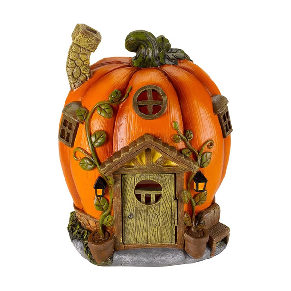A decorative pumpkin shaped house on a white background