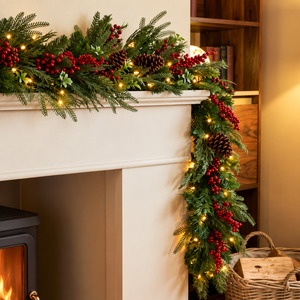 6ft Christmas garland with warm white lights, red berries and pine cones