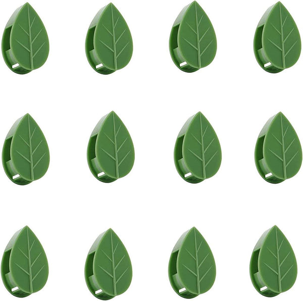 A collection of green leaf-shaped plant support clips.