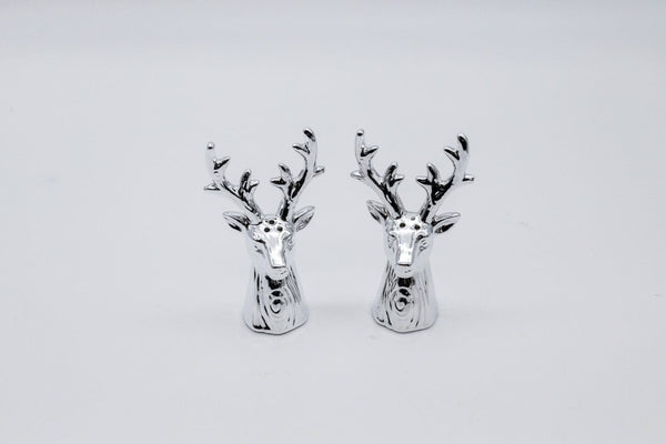 Silver deer head Salt and pepper shakres on a white background