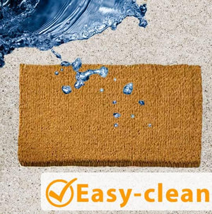 Absorbent coir doormat trapping dirt and moisture