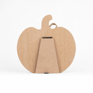 Unpainted wooden pumpkin-shaped ornament with a small hanging loop and a fold-out display stand, shown on a white background.