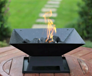 Outdoor heating fire pit for garden dining spaces