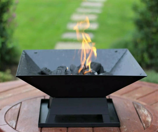 Outdoor heating fire pit for garden dining spaces