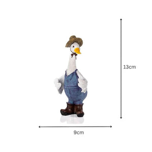 Rustic duck garden figure with warm glowing lanterns