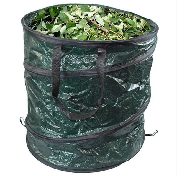 Green garden waste bag filled with leaves on a white background
