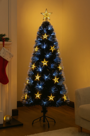 Fibre optic Christmas tree with cool white lights and light up gold stars, beside a lit fireplace in the corner of a livingroom.