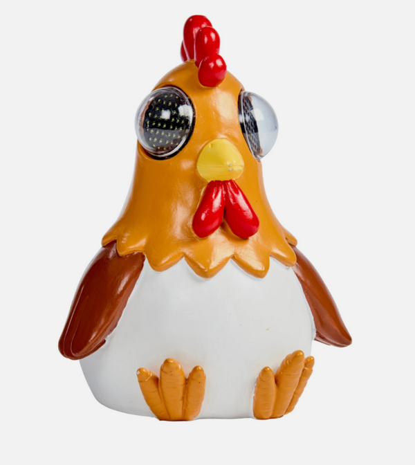 Chicken-shaped salt and pepper shaker on a white background