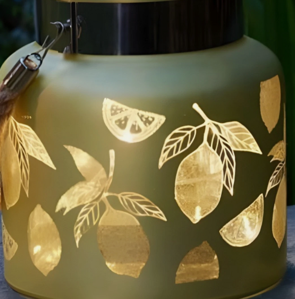 Decorative lantern with lemon pattern on a dark background