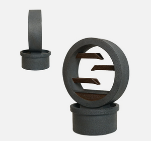 Decorative metal ring with cut-out design on a white background