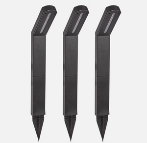 Three black garden tools with pointed ends on a white background