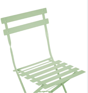 Light green folding chair on a white background