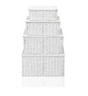 Set of three white woven baskets on a white background