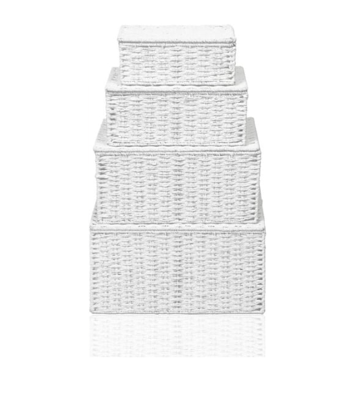 Set of three white woven baskets on a white background