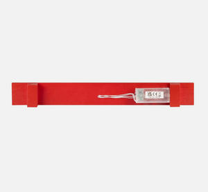 Red belt with a label on a white background