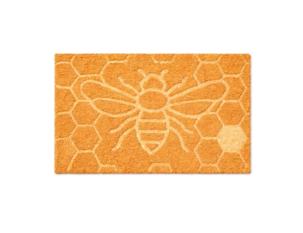 Orange doormat with a floral pattern on a white background