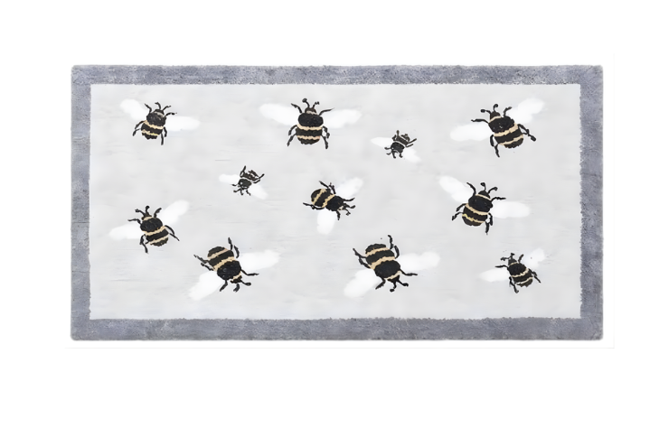 Doormat with bee design on a tiled floor