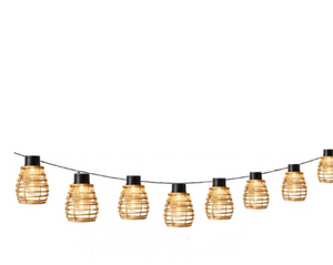String of rattan lanterns on a white background