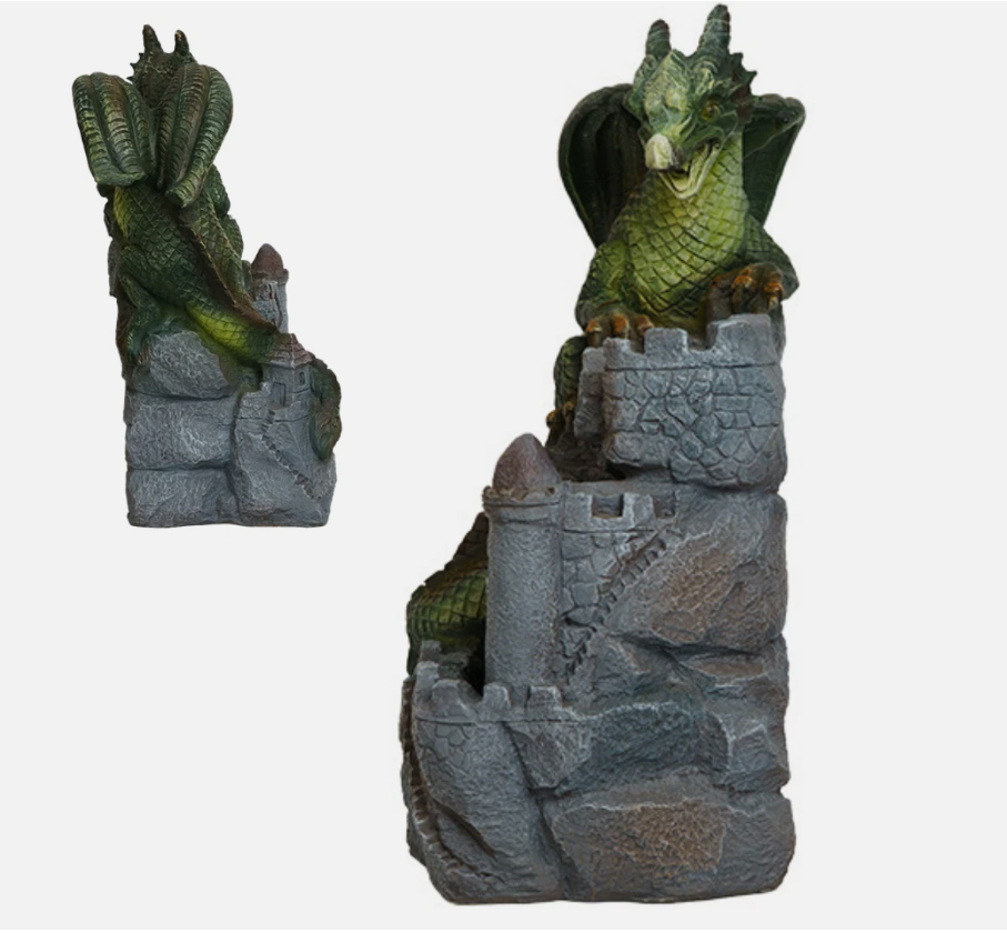 Dragon fountain sculpture on a stone base with water feature, outdoors.