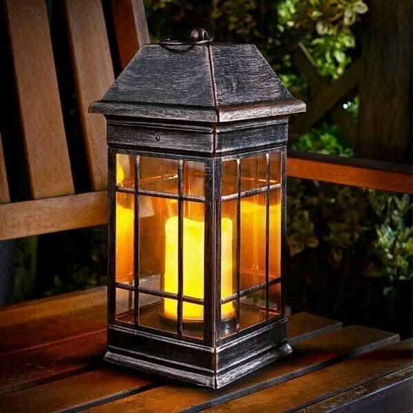 Seville solar LED lantern in garden