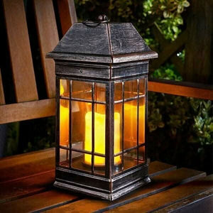 Seville solar LED lantern in garden