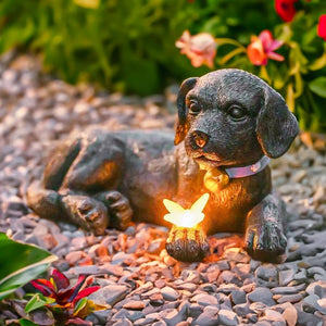 Solar puppy garden ornament with glowing LED lantern