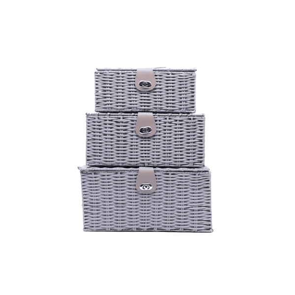 Set of three gray wicker baskets with metal clips on a white background