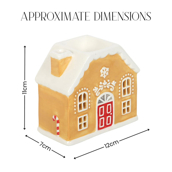 A gingerbread house-shaped candle holder with approximate dimensions labeled: 11 cm height, 12 cm width, and 7 cm depth, on a white background.